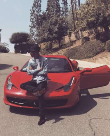 Devion Cromwell and his Ferrari.